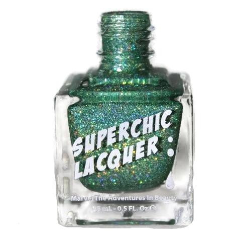 Take The Plunge Nail Polish, glittery green nail polish bottle with a white cap and clear label reading 'Superchic Lacquer'.