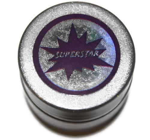 SuperStar - Pure HoloChrome Powder, close-up of the metallic silver container with holographic label and starburst logo.