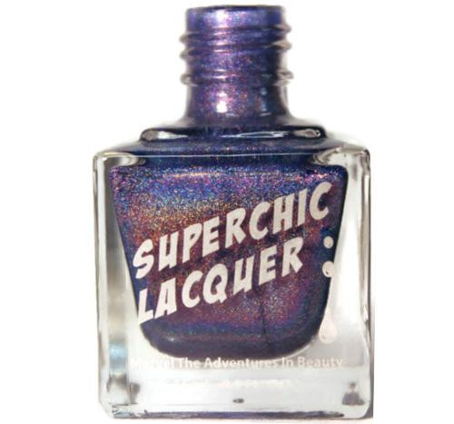 Juju Nail Polish, a shimmering purple nail polish in a clear square bottle with glittery finish and a purple cap.