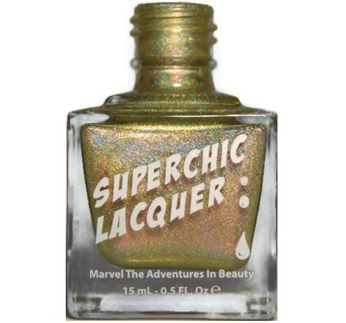 Infectious Nail Polish, holographic gold nail polish in a clear glass bottle with a gold cap.