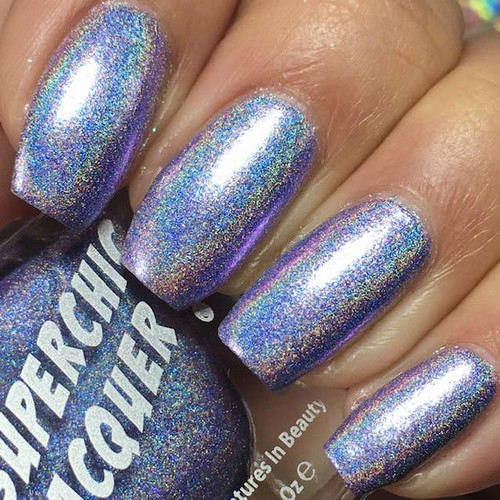 Viral Nail Polish, holographic glittery nail polish on manicured nails.