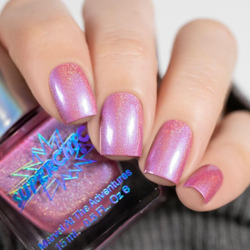 Samantha Nail Polish, pink holographic nail polish with shimmering glitter on manicured nails.