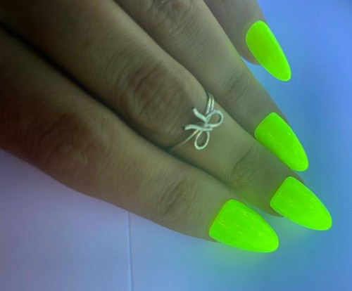 Flashpoint Neon Shimmer Nail Polish, vibrant neon green nail polish on fingernails with a silver bow ring.