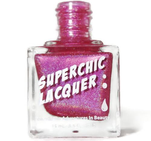 Hot Finger Nail Polish, vibrant pink glitter nail polish in a square glass bottle with a pink cap labeled 'Superchic Lacquer'.