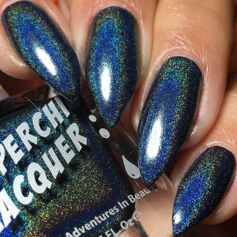 Deadpool Nail Polish, holographic dark blue and black nail polish with multicolored shimmer and shiny glitter finish.