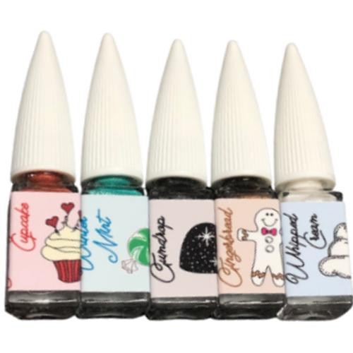 Sweet Winks Liquid Foil Effects Eyeliner, set of five colorful eyeliner bottles with various cute and playful designs on the labels.