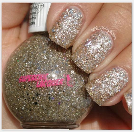 Chronicles Of The Dreamcatcher - Genuine Diamond Nail Polish, close-up of a hand with nails painted in sparkling diamond nail polish with silver and holographic glitter.