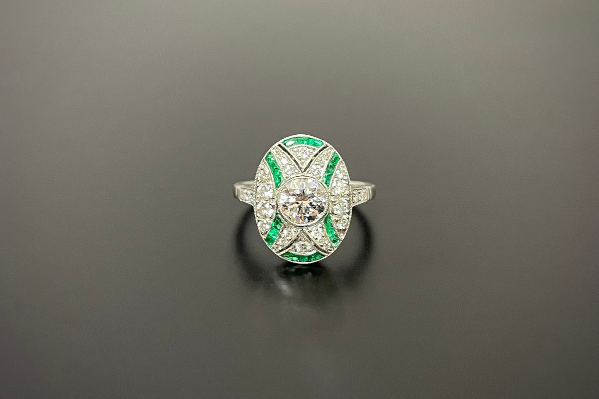 A Divine Diamond and Emerald Plaque Ring A Divine Diamond and Emerald Plaque Ring