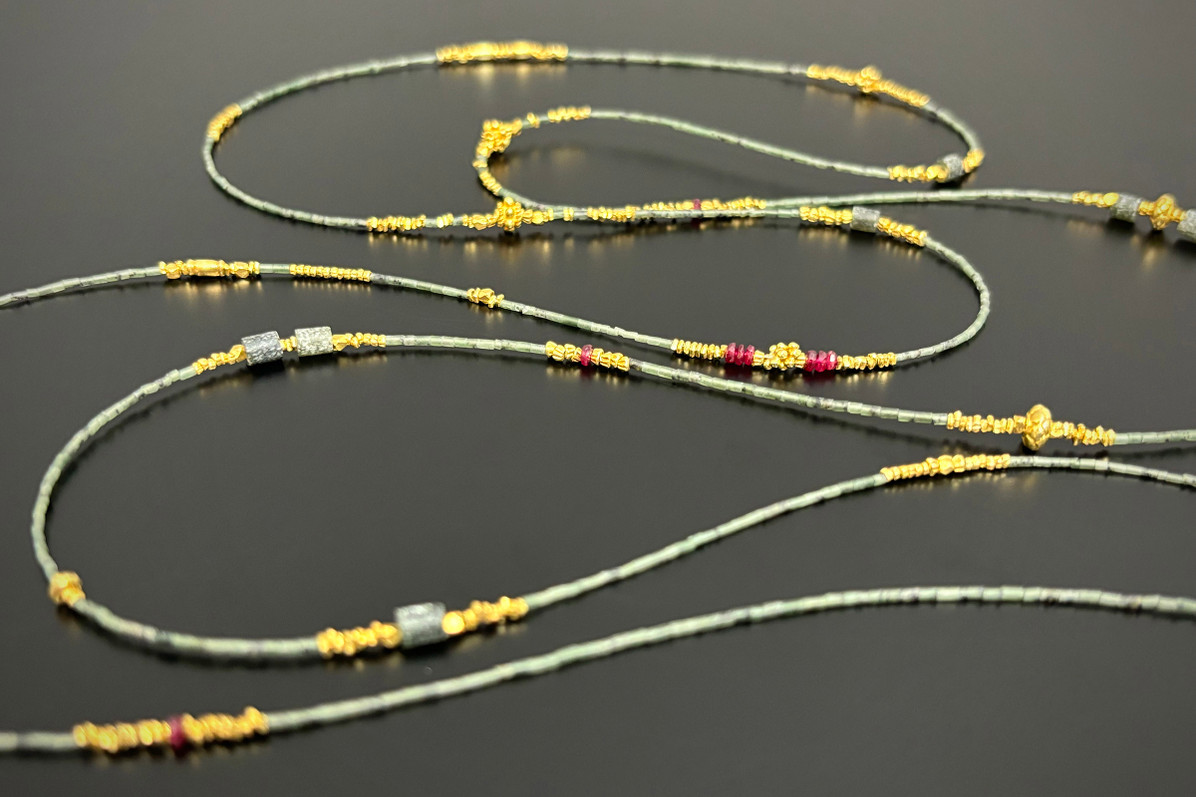 A Delicate Green Jade and Ruby Long Necklace
