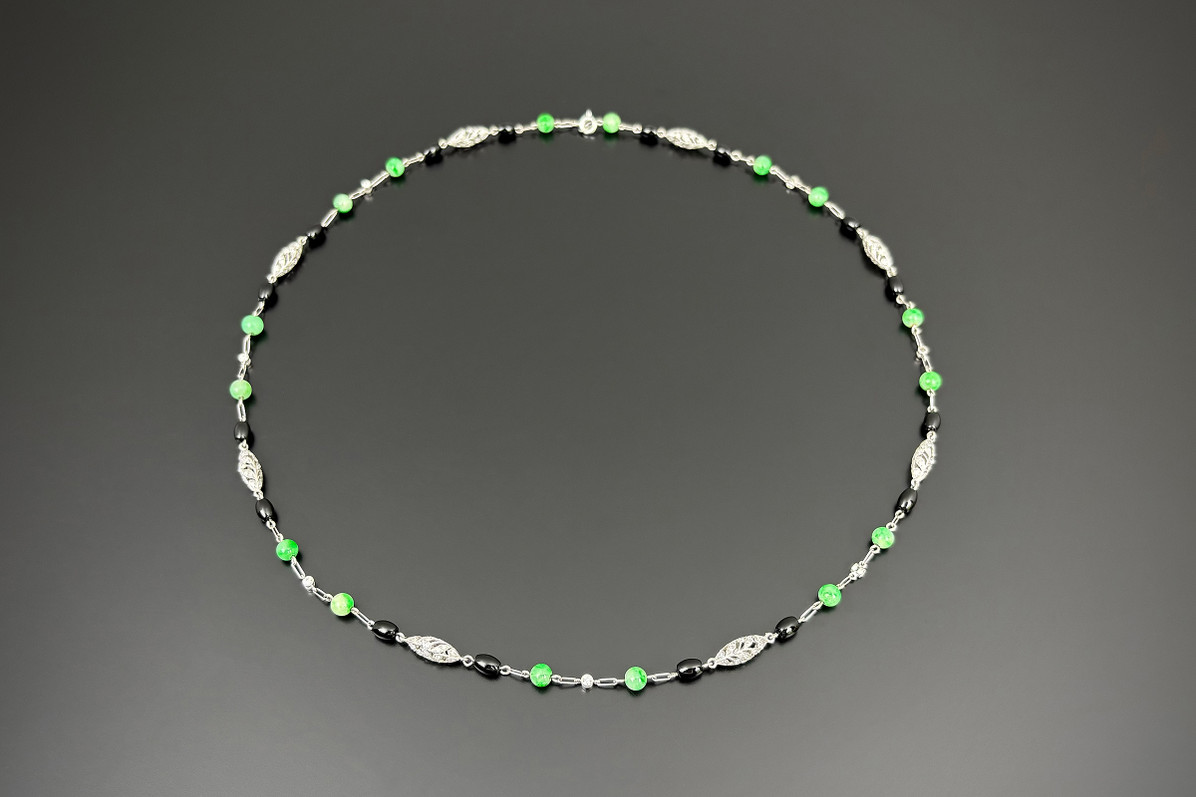An Outstanding Diamond, Jadeite and Onyx Necklace
