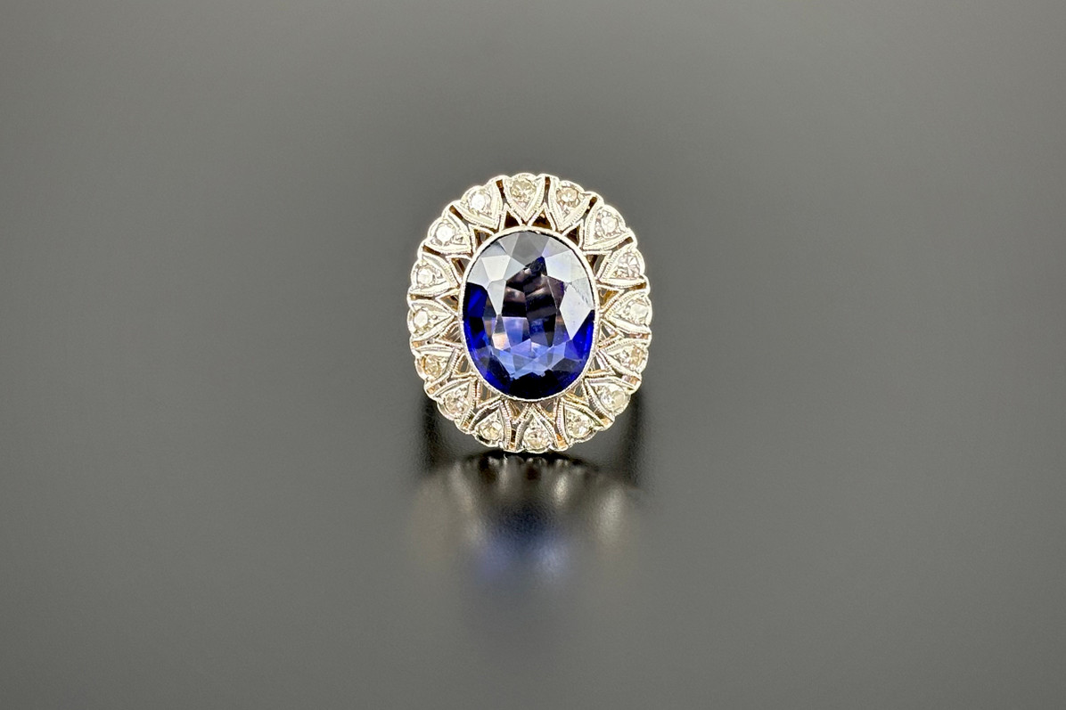 Antique Synthetic Sapphire and Diamond Cluster Ring
Antique Synthetic Sapphire and Diamond Cluster Ring