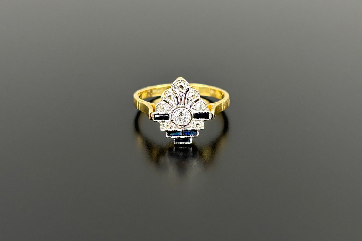 A Delightful Art Deco Diamond and Onyx Plaque Ring
