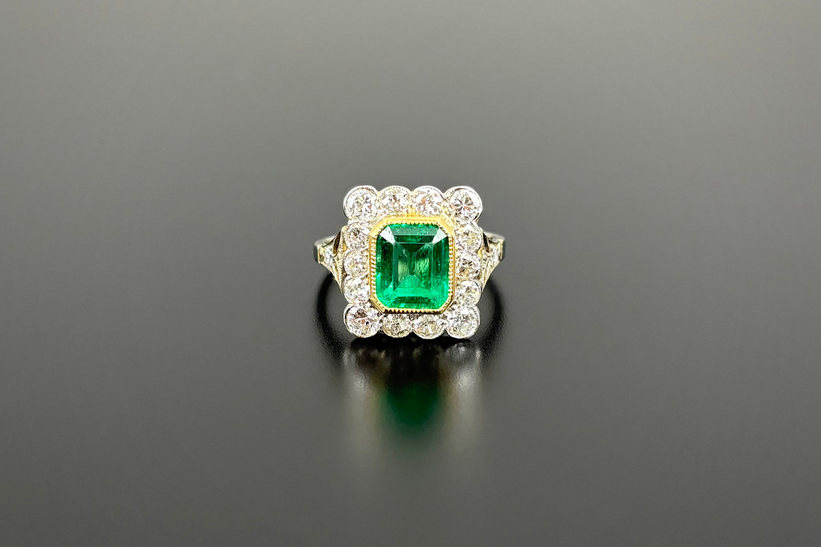 A Fabulous Columbian Emerald and Diamond Plaque Ring
