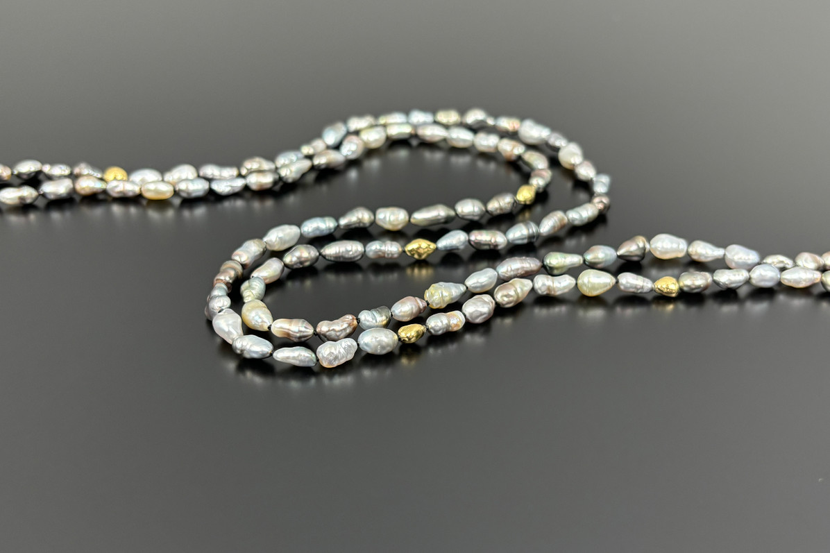 Long Tahitian Keshi Necklace with 18ct gold beads