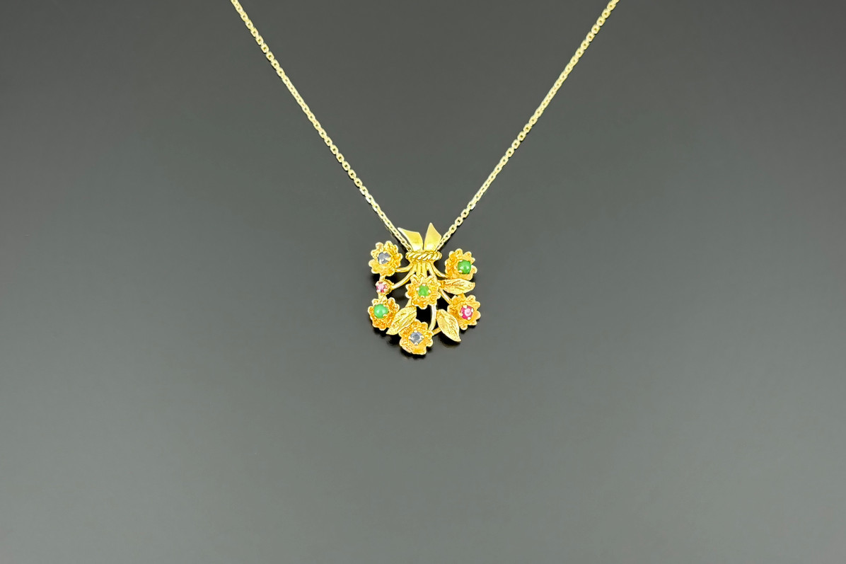 An Antique Multi-Stone and Gold Pendant
