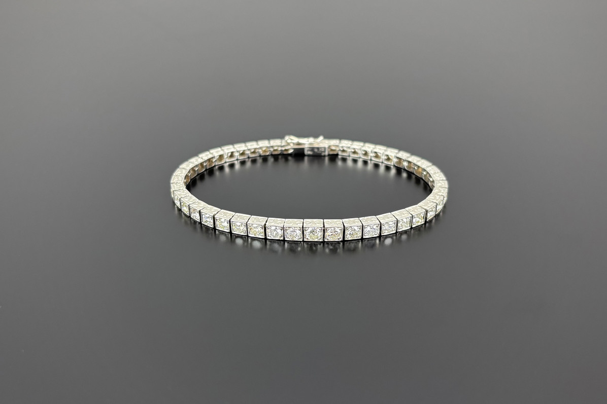 Art Deco diamond line bracelet set in Platinum