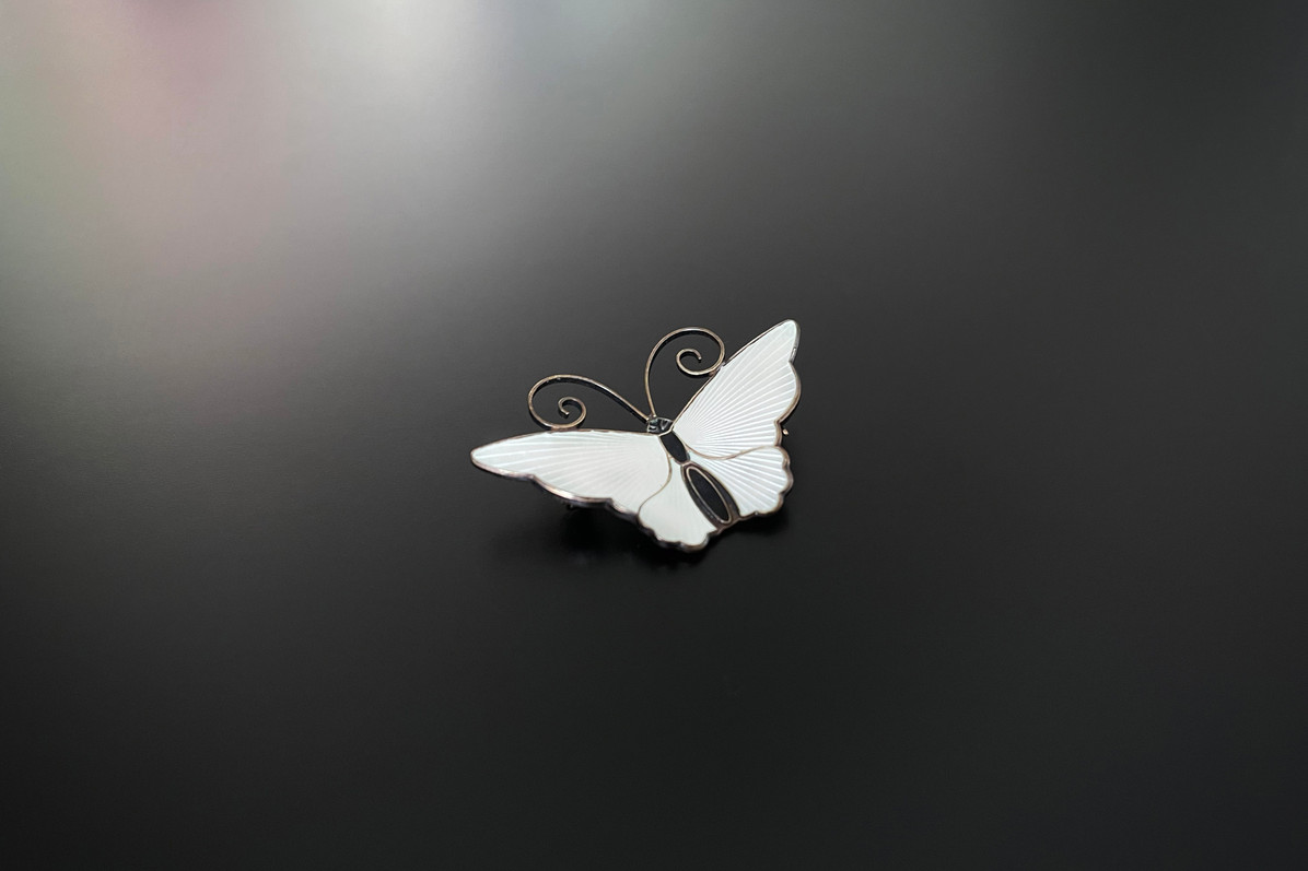 White enamel butterfly by David Anderson