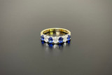 A Kozminsky Oval Diamond and Sapphire Anniversary Ring (YG)