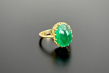 Cabochon emerald ring 18ct yellow gold. Side profile.