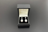 An Elegant Pair of Diamond and Pearl Drop Earrings
