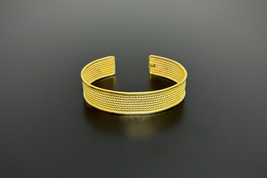 Pierced cuff bangle silver gilt