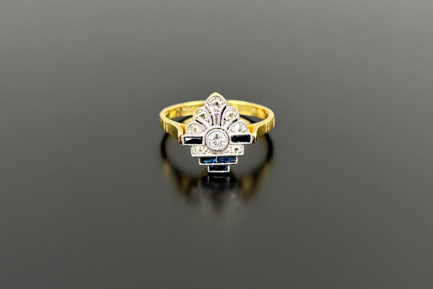 A Delightful Art Deco Diamond and Onyx Plaque Ring
