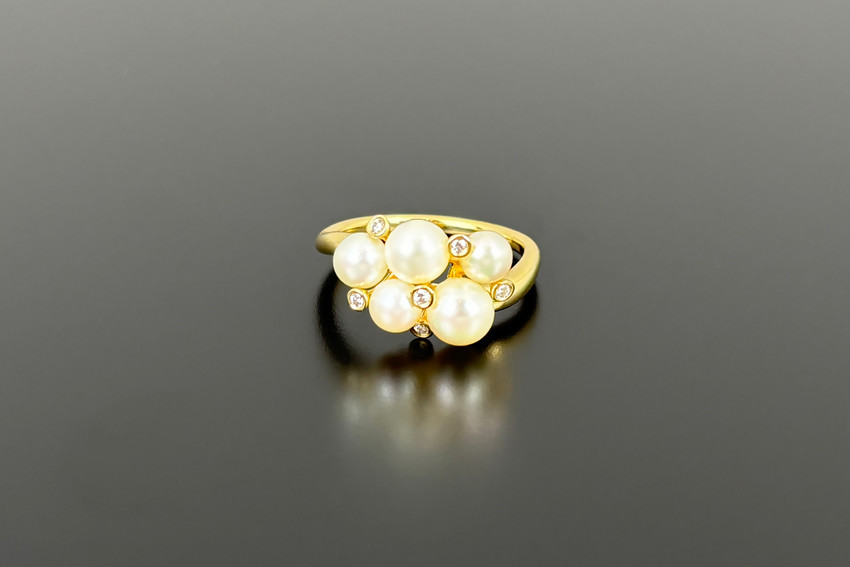 Akoya pearl and diamond cluster ring in 18ct gold