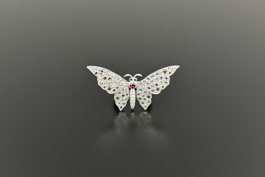 Rose cut diamonds and ruby butterfly ring
