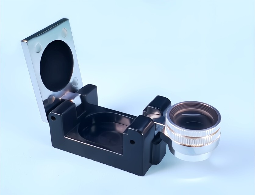 Standard Betamag Folding Loupe shown in black housing
