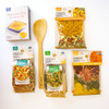 Flat lay of Get Well Gift Box products, showcasing soup mixes and cornbread mix in a visually appealing arrangement