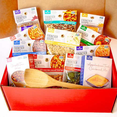 Close-up of Turn Up the Heat Gift Box contents, showing individual soup mixes and cornbread mix with detailed packaging and vibrant colors