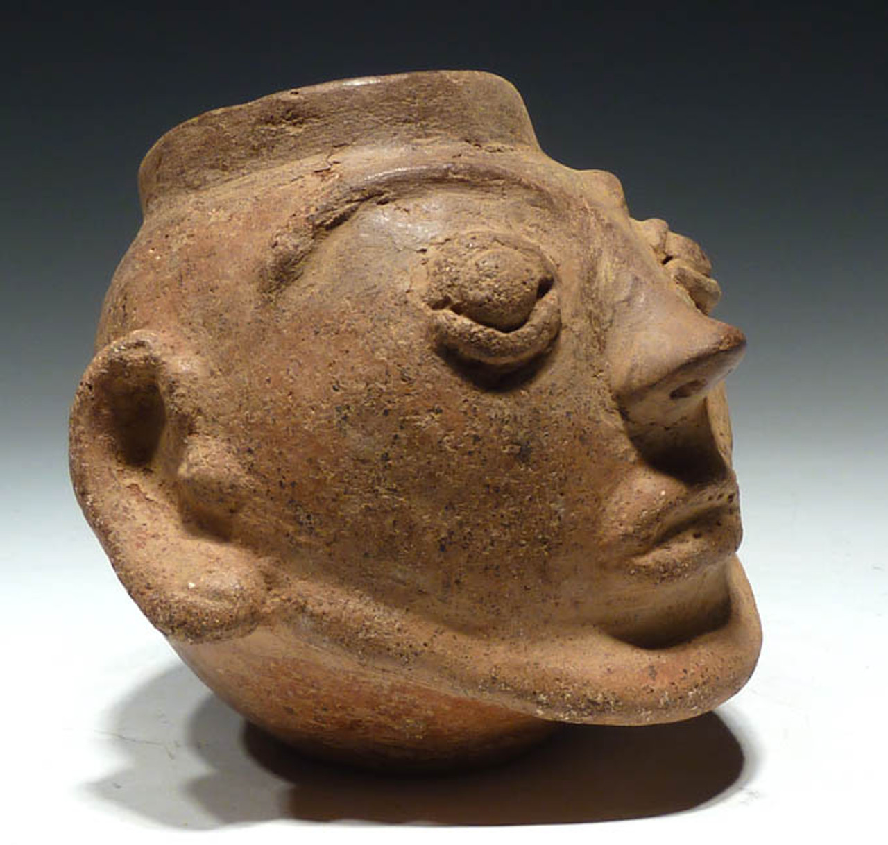 PC017 - PRE-COLUMBIAN HEAD-HUNTING TROPHY HEAD EFFIGY POT OF THE GREATER NICOYA CULTURE