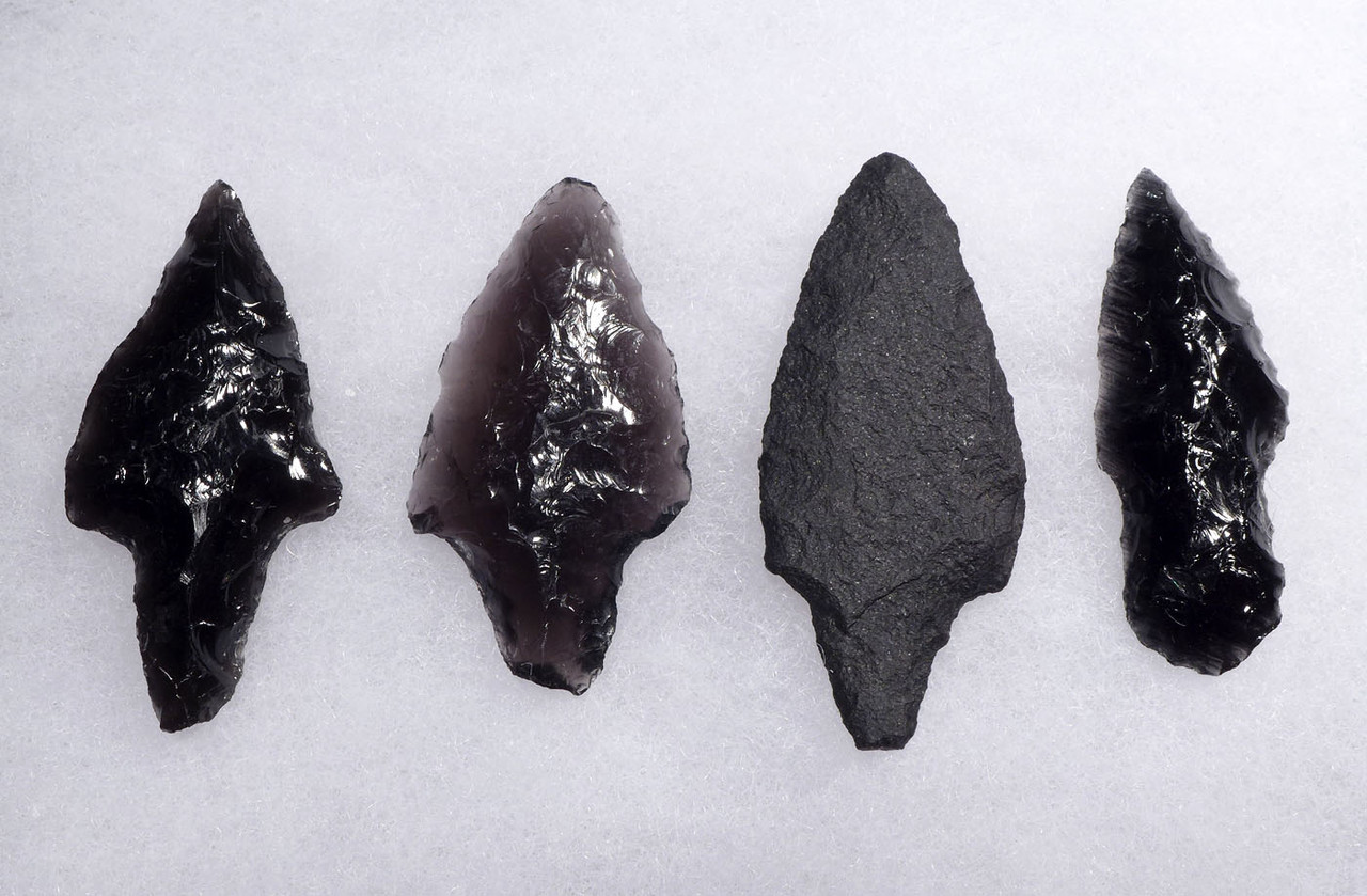 FOUR FINEST ATLATL PRE-COLUMBIAN OBSIDIAN AND BASALT SPEARHEADS OF