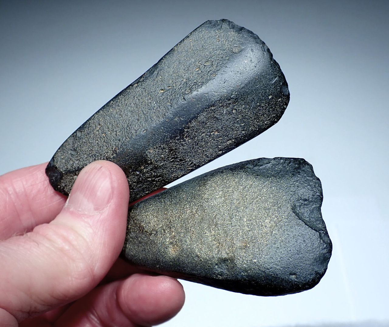 TWO AFRICAN NEOLITHIC GROUND STONE AXES FROM THE CAPSIAN CULTURE