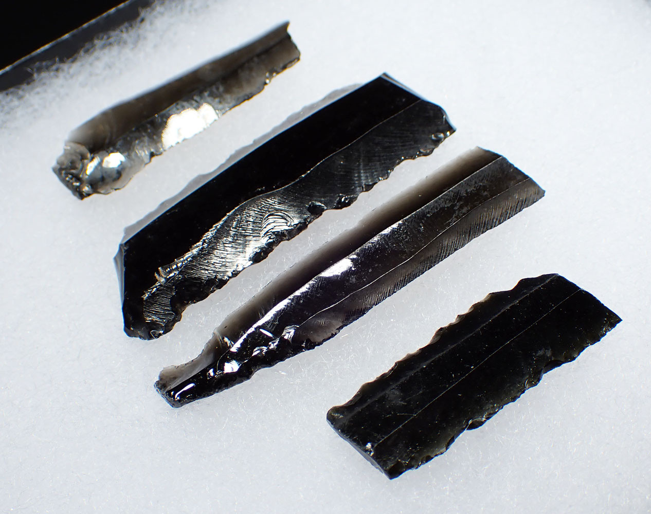 SET OF FOUR AZTEC PRE-COLUMBIAN OBSIDIAN PRISMATIC BLOOD-LETTING
