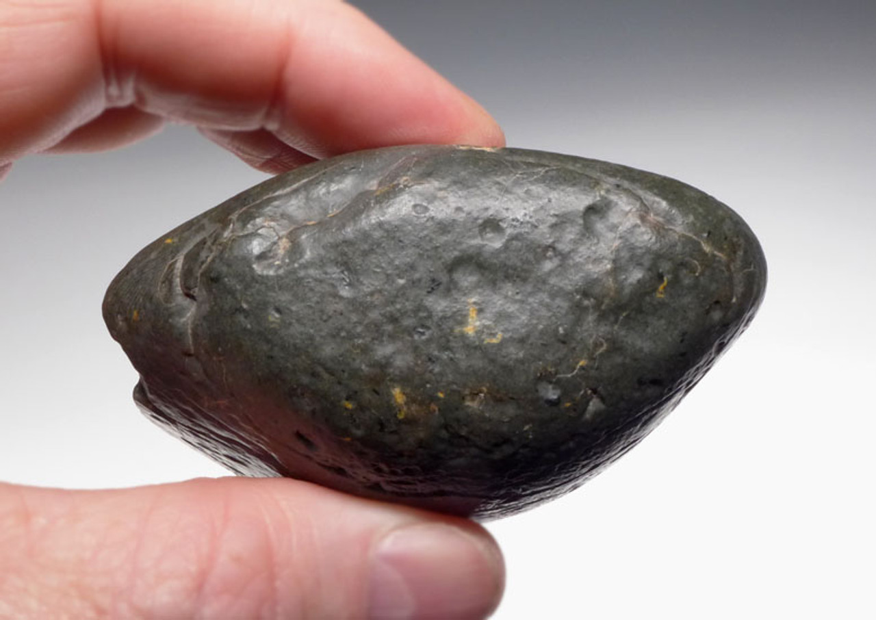 PB103 - CLASSIC OLDOWAN PEBBLE TOOL MADE OUT OF UNUSUAL GREEN VOLCANIC STONE WITH INCREDIBLE WIND EROSION PATINA