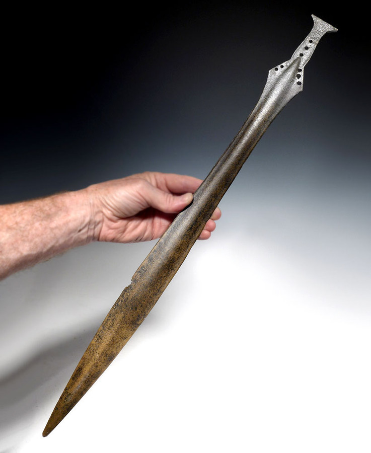 FINEST ANCIENT IRISH CELTIC BRONZE FLANGEHILTED SWORD FROM LATE BRONZE