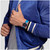 Modelo mostrando el Reloj Swatch Polablue con chaqueta azul - SO29K702