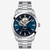 Vista frontal del Tissot Gentleman Powermatic 80 Open Heart con brazalete de acero y esfera azul - T1274071104101