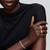 Modelo luciendo la Pulsera Pandora de Tenis Brillante con engaste a nivel en color dorado combinada con anillos - 563927C01