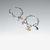 Charm Pandora Medallón Amanecer en metal chapado en oro y color blanco junto a otros charms en pulseras de plata - 763859C01