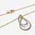 Primer plano del Collar Pandora Doble en Dos Tonos resaltando los tonos dorado y plateado - 364668C00