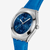 Vista lateral del Reloj Swatch Blue Petal Promise con correa de piel azul y esfera azul - YLS235