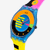 Vista lateral del Reloj Swatch Swatch Neon Flumotions con esfera azul y correa de silicona multicolor - SS08S101