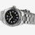 Vista angulada del Reloj Hamilton Khaki Field Expedition Auto con brazalete de acero y esfera negra - H70315130