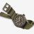 Vista superior del Reloj Khaki Field Mechanical mostrando el brazalete textil verde con hebilla - H69449961