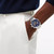 Modelo luciendo el Reloj Tommy Hilfiger cronógrafo de acero inoxidable con esfera azul marino en vista lateral - 1792278