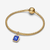 Charm Colgante Pandora Hexágono Azul Celestial presentado sobre una pulsera rígida - 765035C01