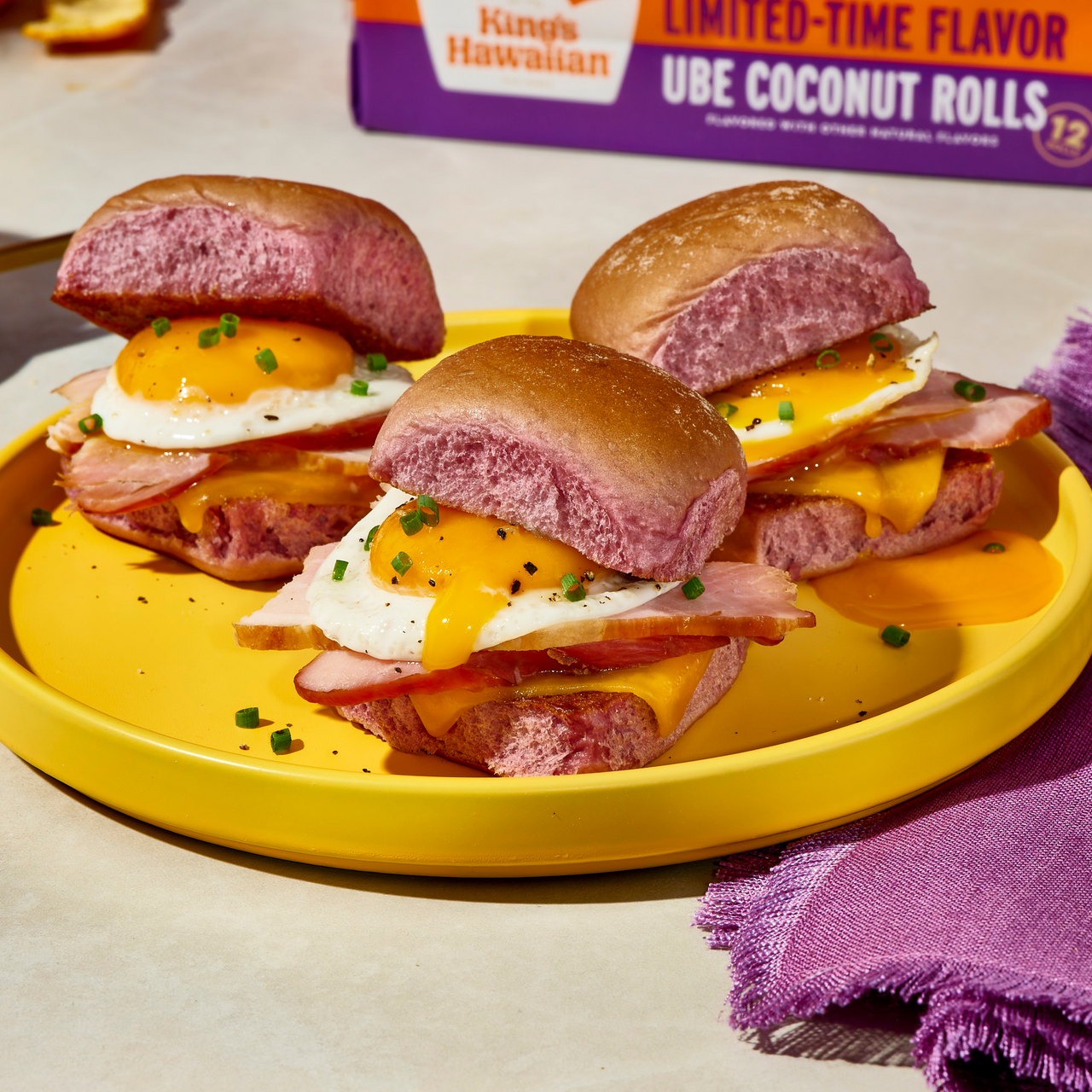King's Hawaiian Ube Coconut Rolls Made into Egg cheese and bacon sliders