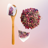 Image of Spoon with Tea bag and loose tea on Pink to purple gradient background